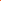 A close-up of Super Cheap Fabrics’ Cotton Jersey - Mandarin Orange (165cm), showing visible creases and slight wrinkles as the bright fabric is unrolled on a flat surface.
