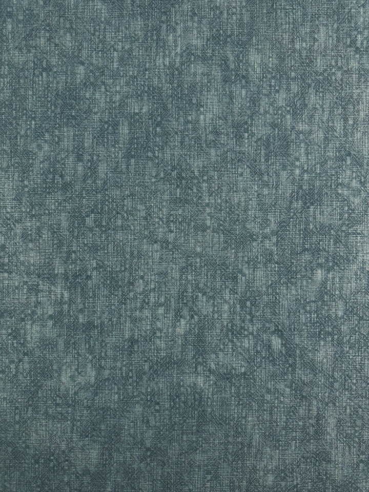 The Basket Dyed Cotton in Peacock from Super Cheap Fabrics features a blue hue with a subtle twill weave pattern that adds depth and intricacy. This 100% cotton material has a soft, slightly mottled appearance, making it an elegant choice for upholstery fabric projects. With a width of 140cm, it's ideal for creating natural and sophisticated designs.