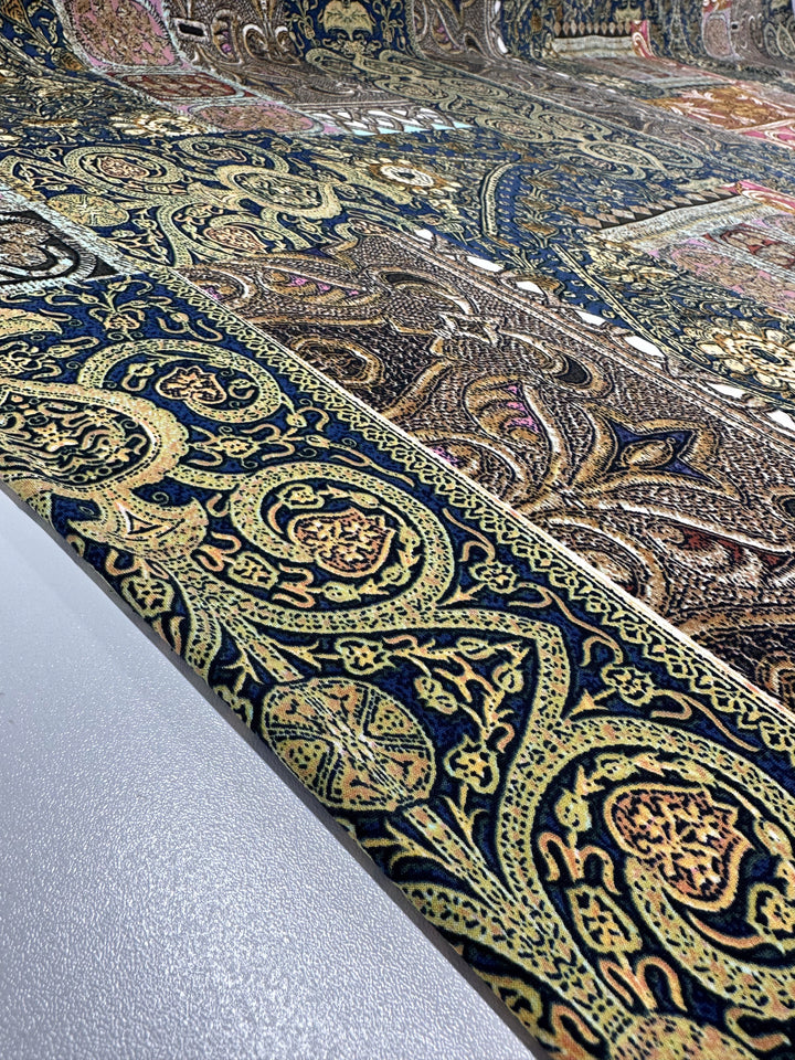 A close-up of an intricately woven Persian rug, echoing the elegance of Super Cheap Fabrics' Printed Lycra - Mosaic Patchwork (150cm), features complex dark blue, gold, and beige patterns with geometric and floral designs.