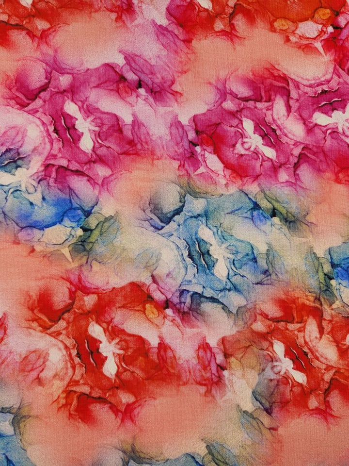 Introducing the Designer Cotton - Roses - 150cm from Super Cheap Fabrics, featuring a vibrant abstract pattern in swirling shades of pink, red, blue, and green. Resembling watercolor or marble textures, this intricate and fluid design adds sophistication to luxury sewing projects with its sense of movement and depth.