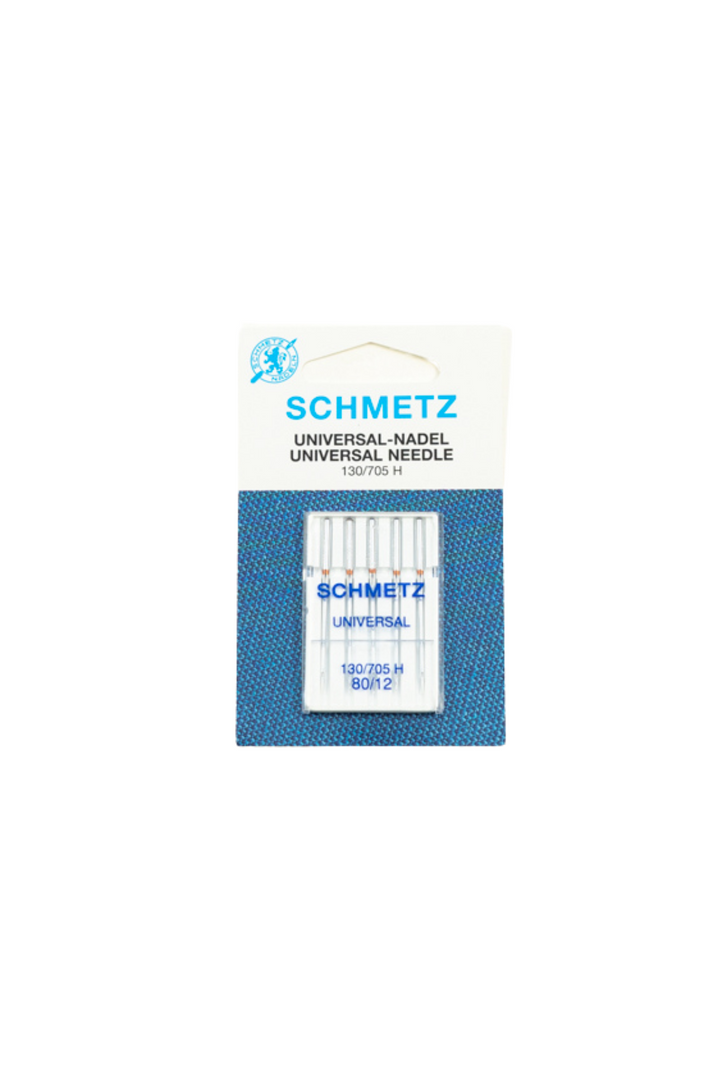 A package of Super Cheap Fabrics Machine Needles Universal, size 80/12, displayed on a white background. The packaging features blue text and a small graphic of a sewing needle, marked with the code 130/705H.